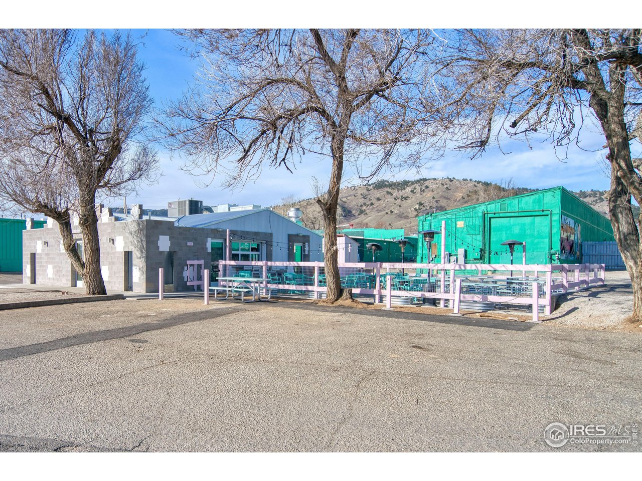 4944 Dakota Boulevard Boulder, CO 80304 - Photo 37 of 40 a couple of table and chairs under an umbrella