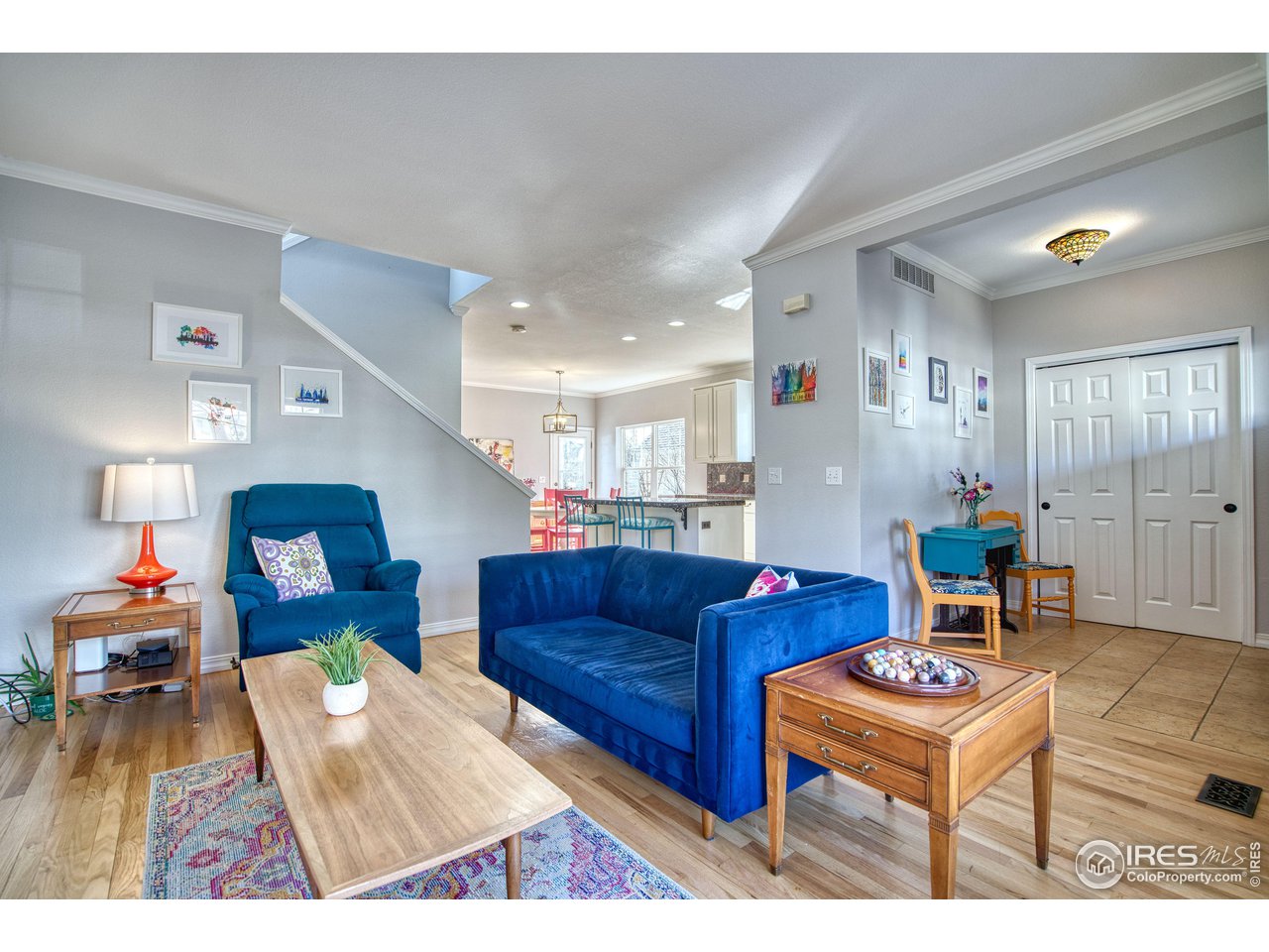 4944 Dakota Boulevard Boulder, CO 80304 - Photo 8 of 40 a living room with furniture and a wooden floor