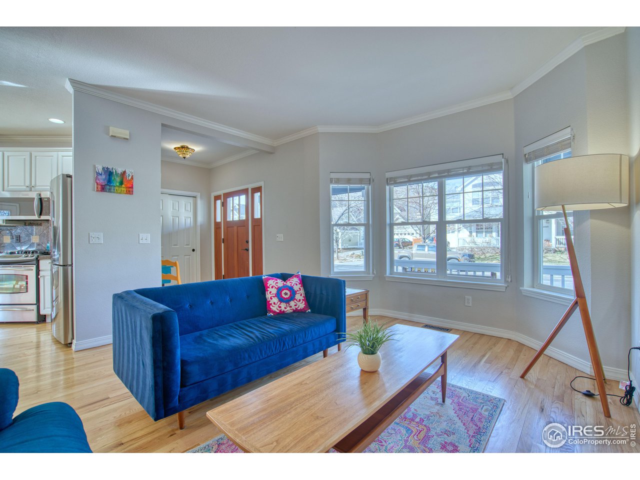 4944 Dakota Boulevard Boulder, CO 80304 - Photo 9 of 40 a living room with furniture and a hard wood floor