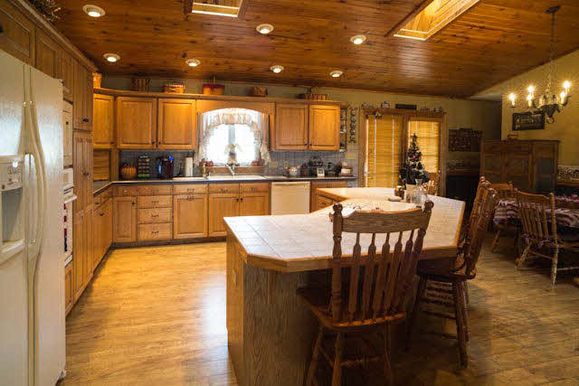 2252 Kerns Road Dayton, VA 22821 - Photo 17 of 31 a large kitchen with a table and chairs