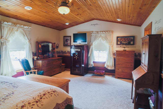 2252 Kerns Road Dayton, VA 22821 - Photo 18 of 31 a bedroom with a bed dresser and a flat tv screen