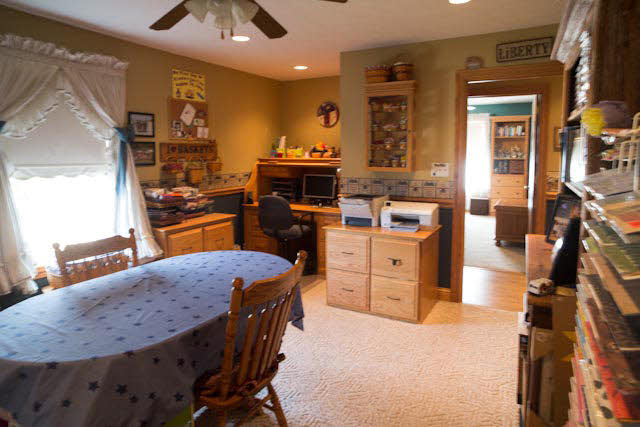 2252 Kerns Road Dayton, VA 22821 - Photo 4 of 31 a kitchen with stainless steel appliances kitchen island granite countertop a table chairs in it and wooden floors