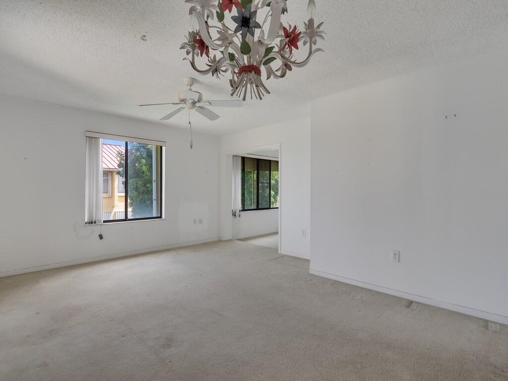 5373 Southeast Miles Grant Road, Unit 208 Stuart, FL 34997 - Photo 9 of 32 a view of a window in a room