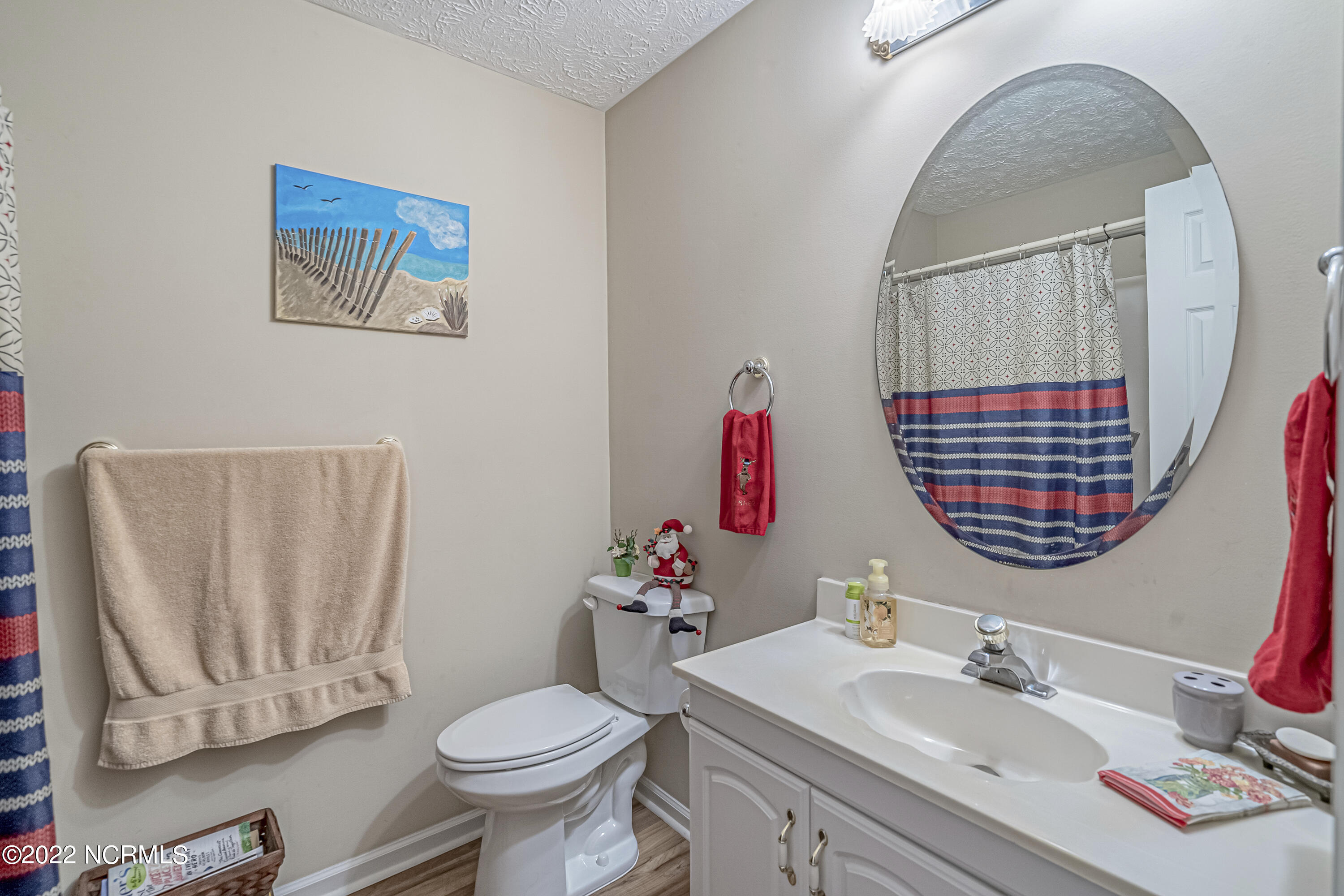 6824 Roberta Road Southwest Ocean Isle Beach, NC 28469 - Photo 26 of 37 Guest Bathroom