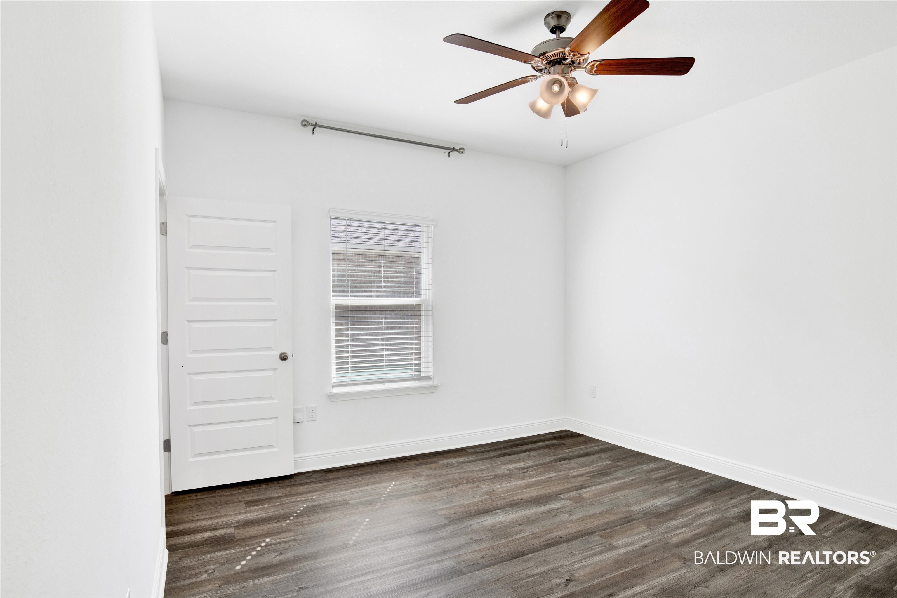 11602 Genuine Risk Circle Daphne, AL 36526 - Photo 23 of 30 Spare room featuring dark wood finished floors and ceiling fan