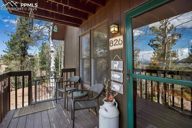 a view of a porch with furniture