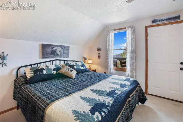 a bedroom with bed and a window