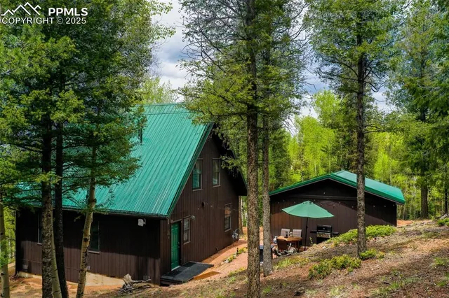 a view of backyard with seating space