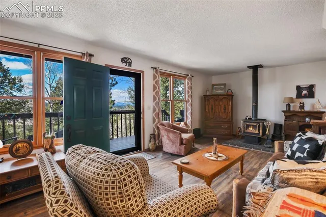 a living room with furniture and a table