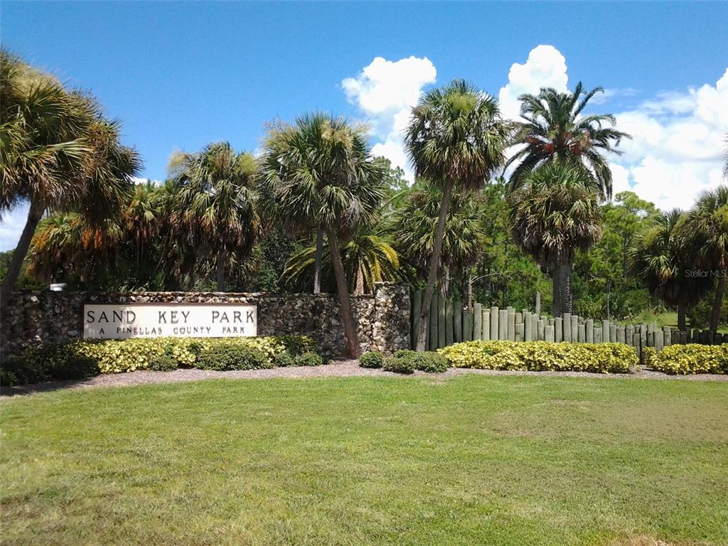 1029 10th Street Northwest, Unit B Largo, FL 33770 - Photo 20 of 20 a front view of a house with garden
