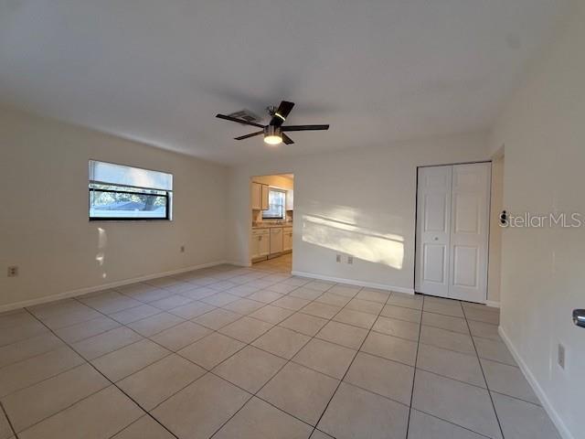 1029 10th Street Northwest, Unit B Largo, FL 33770 - Photo 2 of 20 a view of an empty room with a window