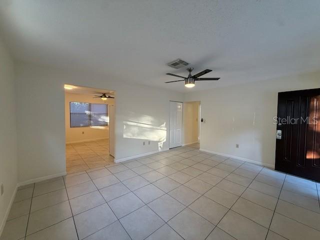1029 10th Street Northwest, Unit B Largo, FL 33770 - Photo 5 of 20 a view of a livingroom with a ceiling fan and window