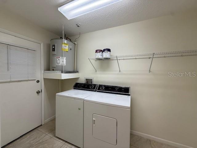 1029 10th Street Northwest, Unit B Largo, FL 33770 - Photo 7 of 20 a utility room with dryer and washer