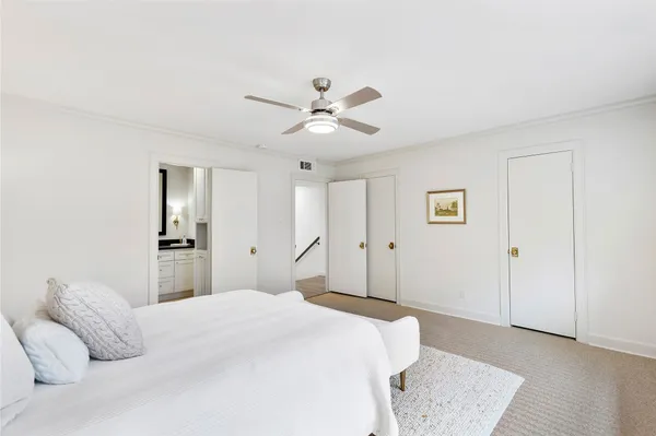 a bathroom with a sink a vanity and a mirror