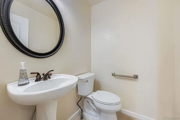 a bed room with a bed and a window