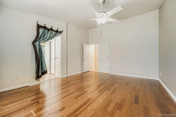 a spacious bathroom with a double vanity sink mirror and bathtub