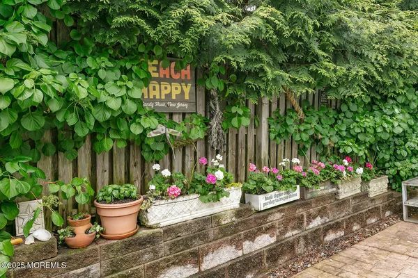 a view of a patio with swimming pool table and chairs