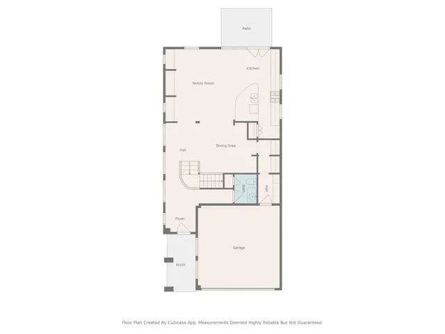 a room with cabinets and washer