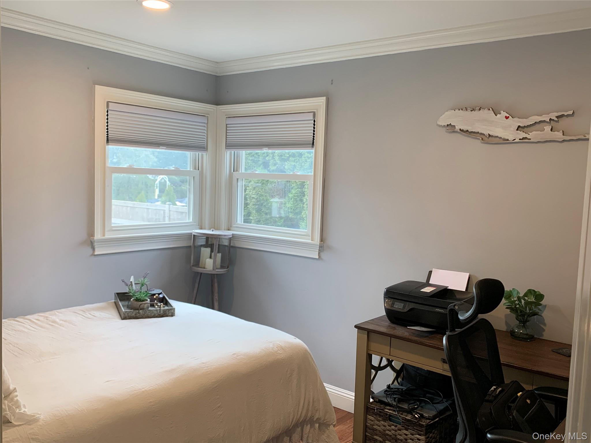 6 Robinson Street Shoreham, NY 11786 - Photo 13 of 28 a bedroom with a bed and a window