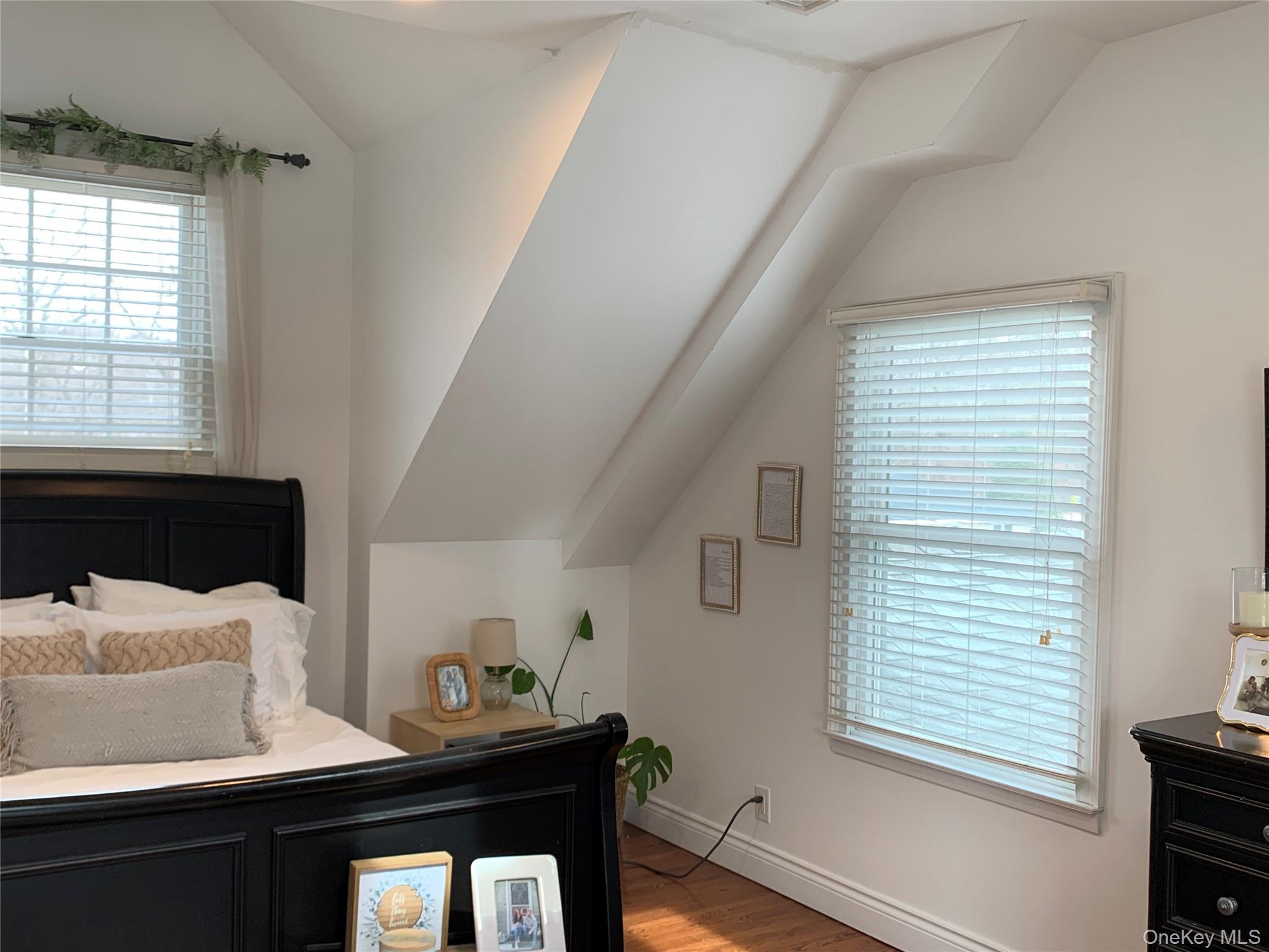 6 Robinson Street Shoreham, NY 11786 - Photo 18 of 28 a living room with furniture and a window