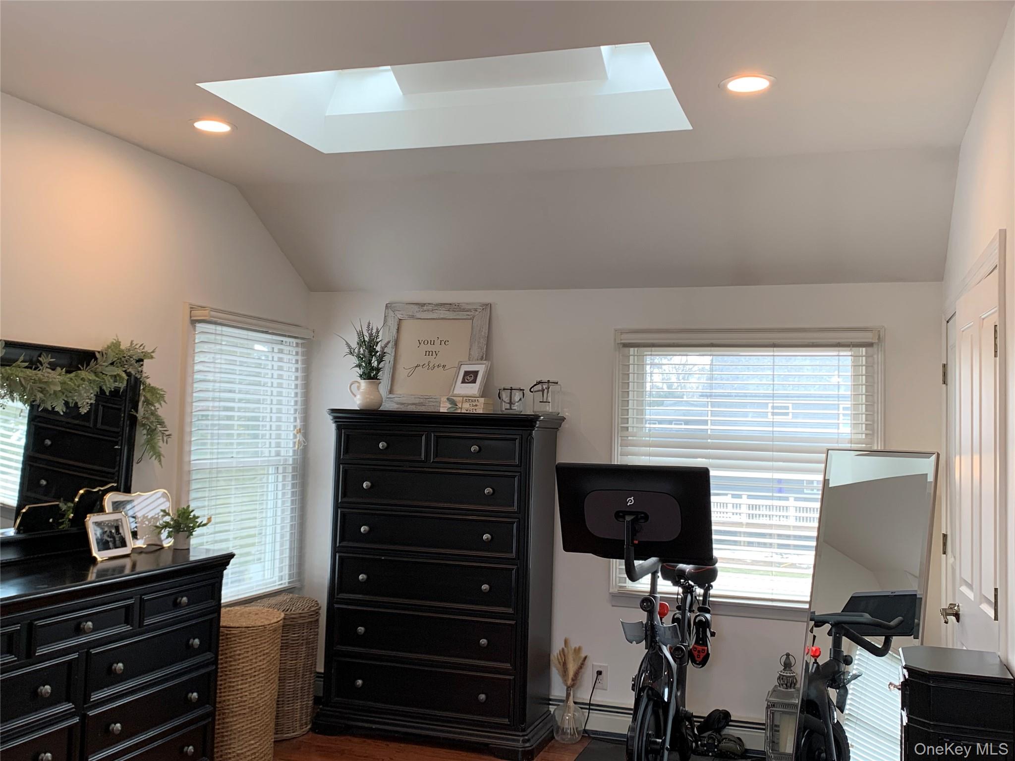 6 Robinson Street Shoreham, NY 11786 - Photo 19 of 28 a room with a dresser and a flat screen tv