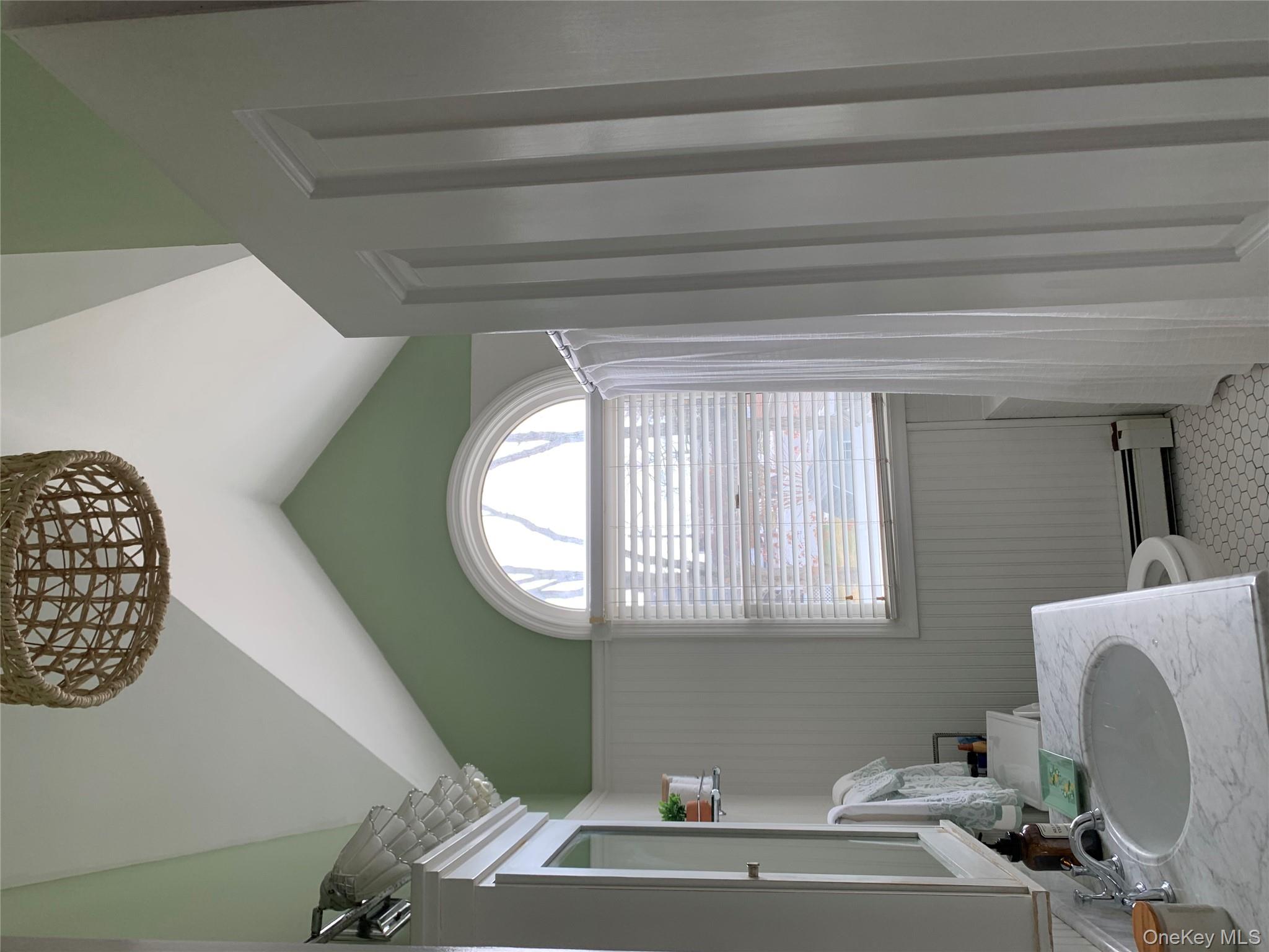 6 Robinson Street Shoreham, NY 11786 - Photo 21 of 28 a bathroom with a sink and a mirror