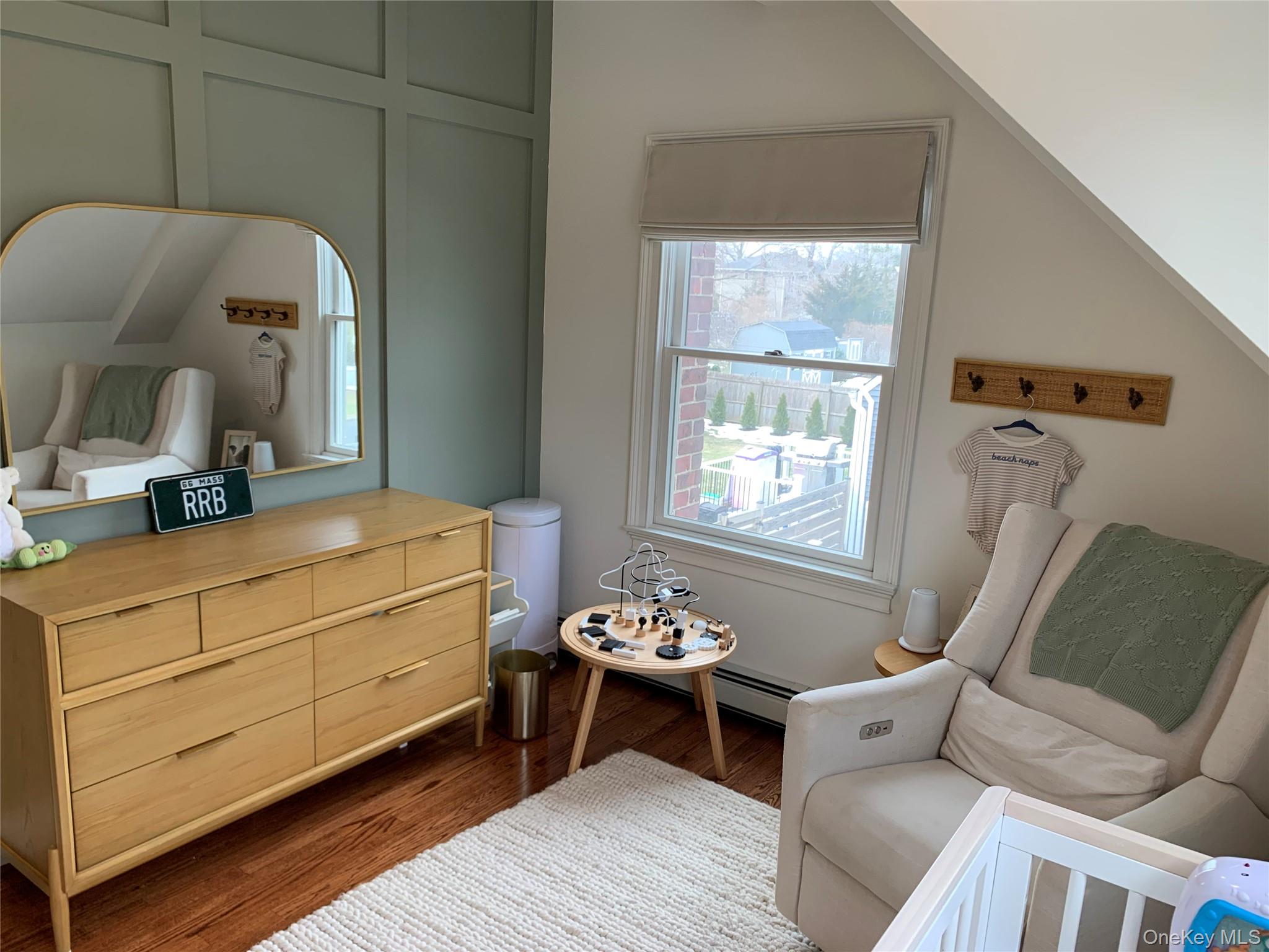 6 Robinson Street Shoreham, NY 11786 - Photo 24 of 28 a living room with furniture and window