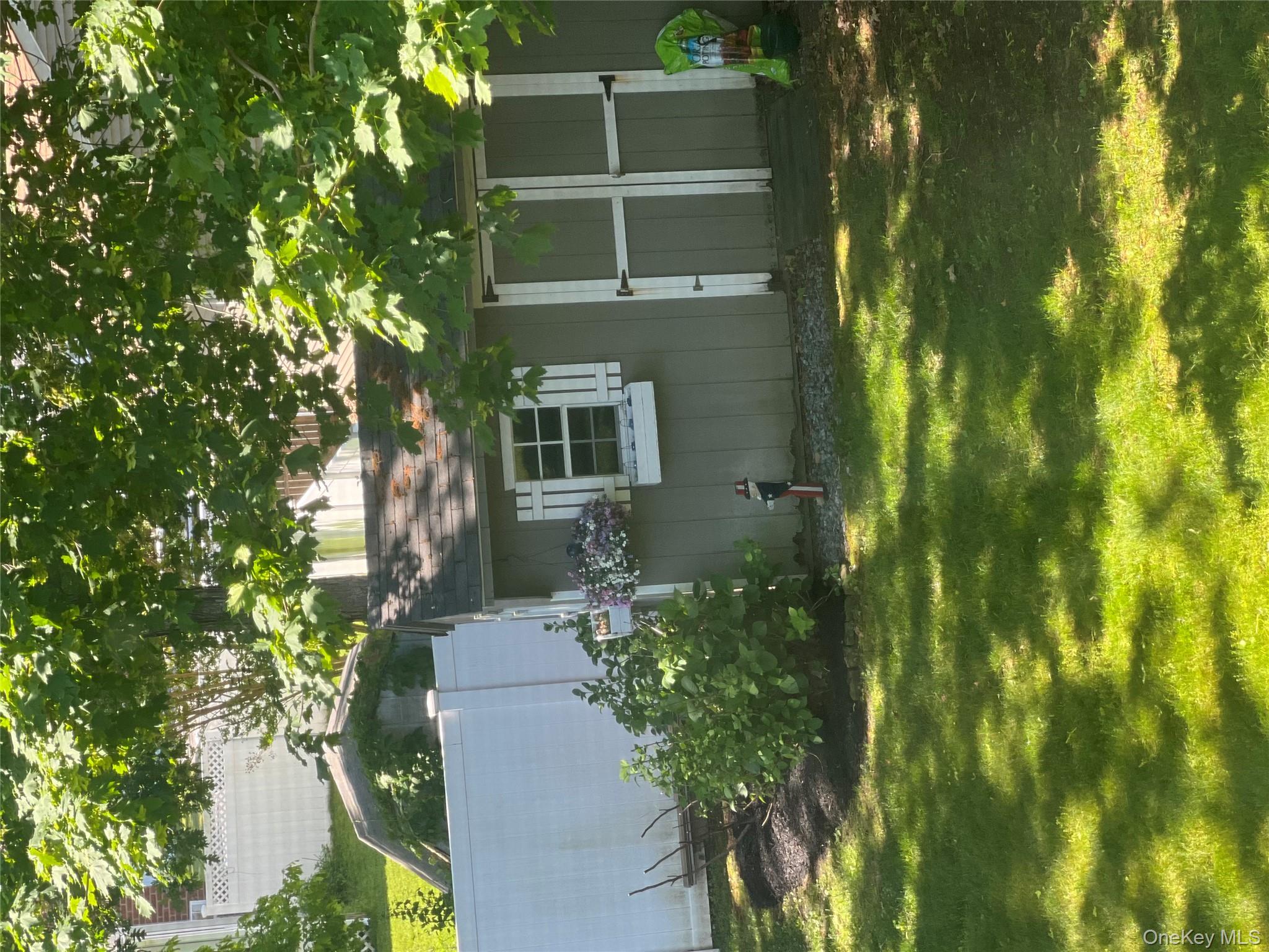 6 Robinson Street Shoreham, NY 11786 - Photo 28 of 28 a view of a backyard