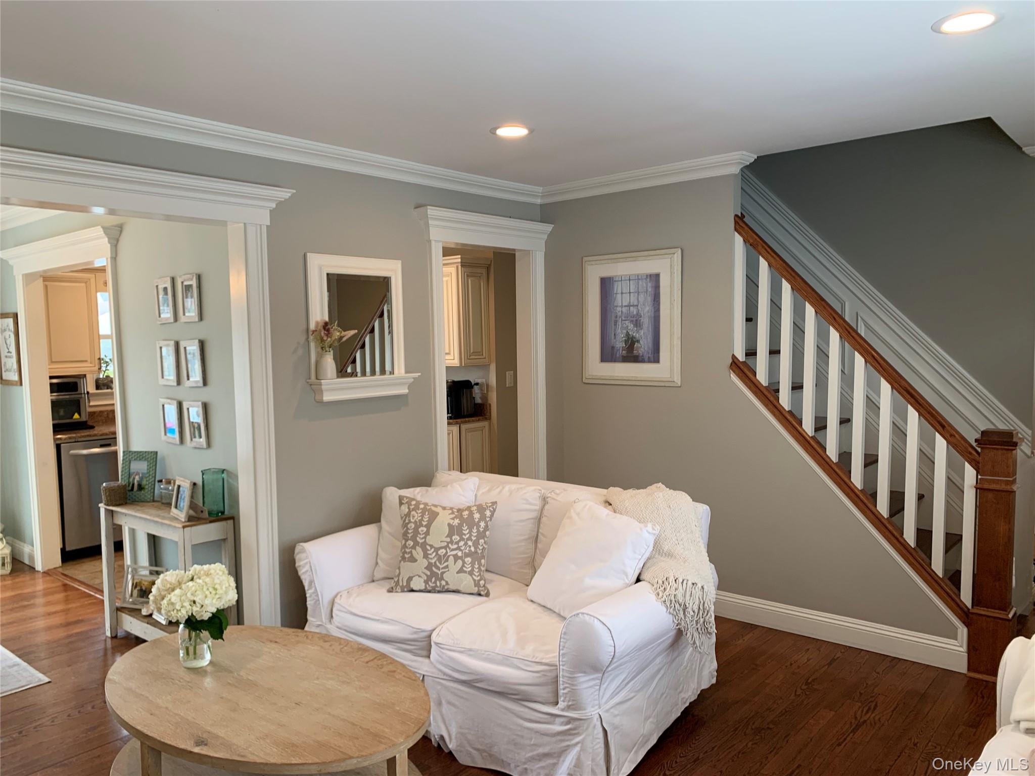 6 Robinson Street Shoreham, NY 11786 - Photo 5 of 28 a living room with furniture and a wooden floor