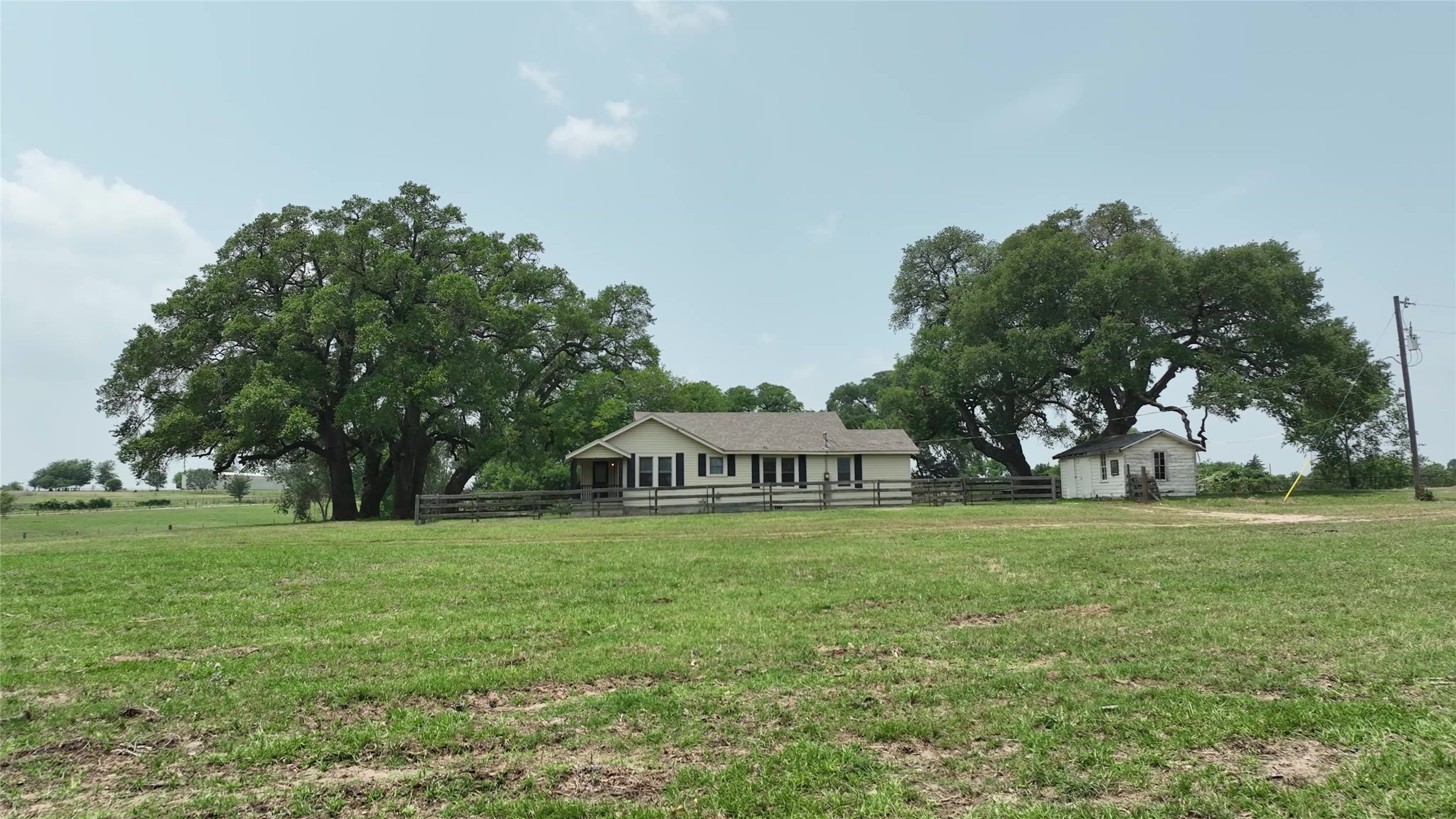 7009 Sandy Hill Road Brenham, TX 77833 - Photo 13 of 41 a view of an outdoor space and a yard