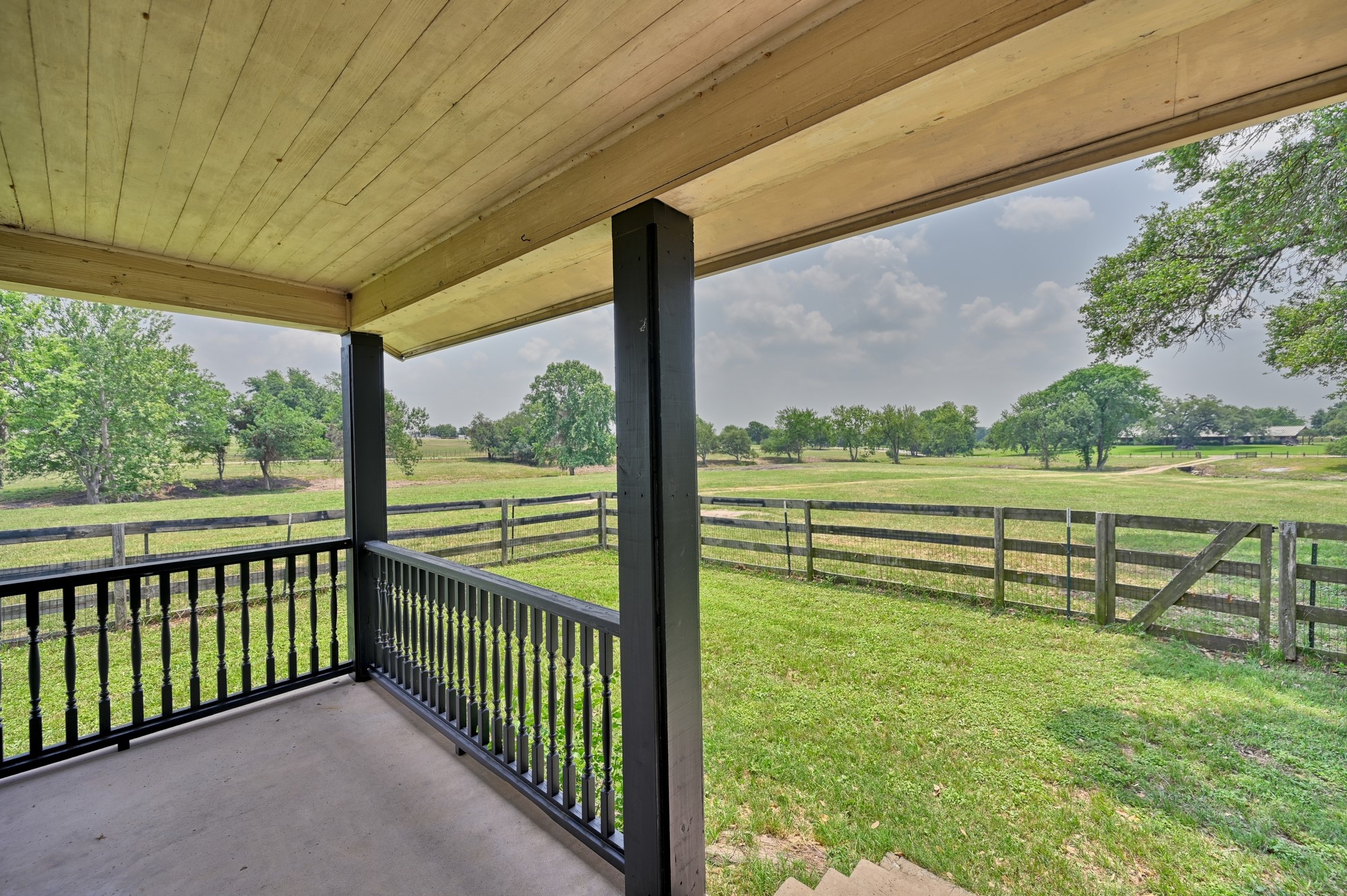 7009 Sandy Hill Road Brenham, TX 77833 - Photo 18 of 41 a view of outdoor space with deck and yard
