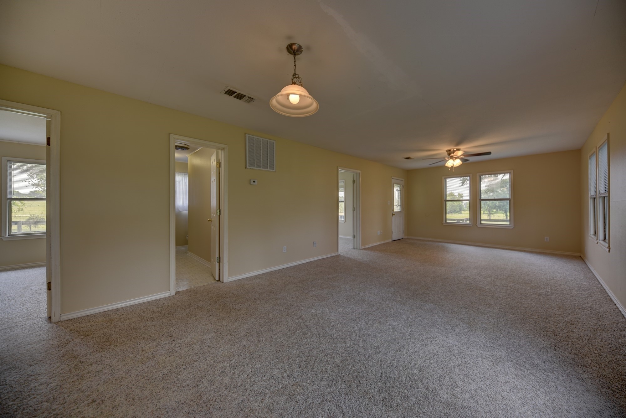 7009 Sandy Hill Road Brenham, TX 77833 - Photo 20 of 41 a view of an empty room with a window