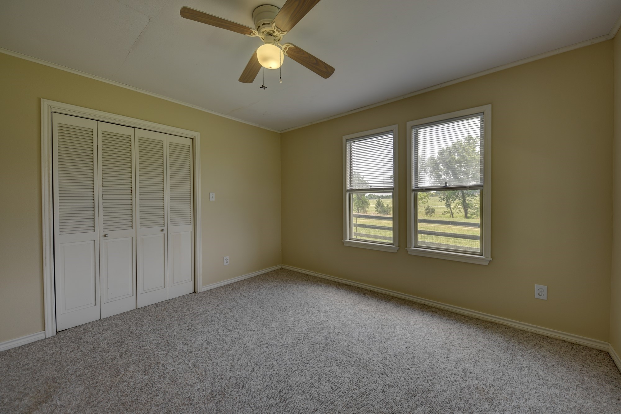 7009 Sandy Hill Road Brenham, TX 77833 - Photo 23 of 41 a view of an empty room with a window