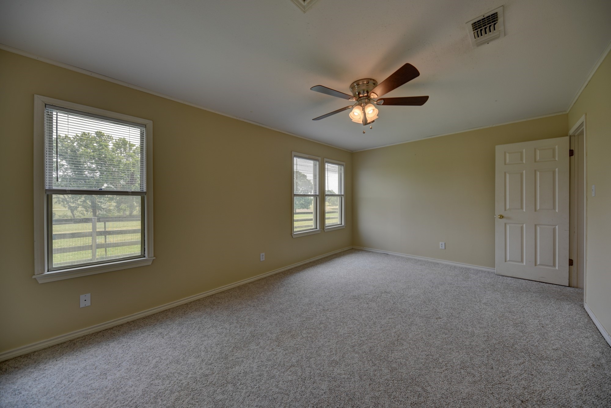 7009 Sandy Hill Road Brenham, TX 77833 - Photo 25 of 41 a view of an empty room with a window