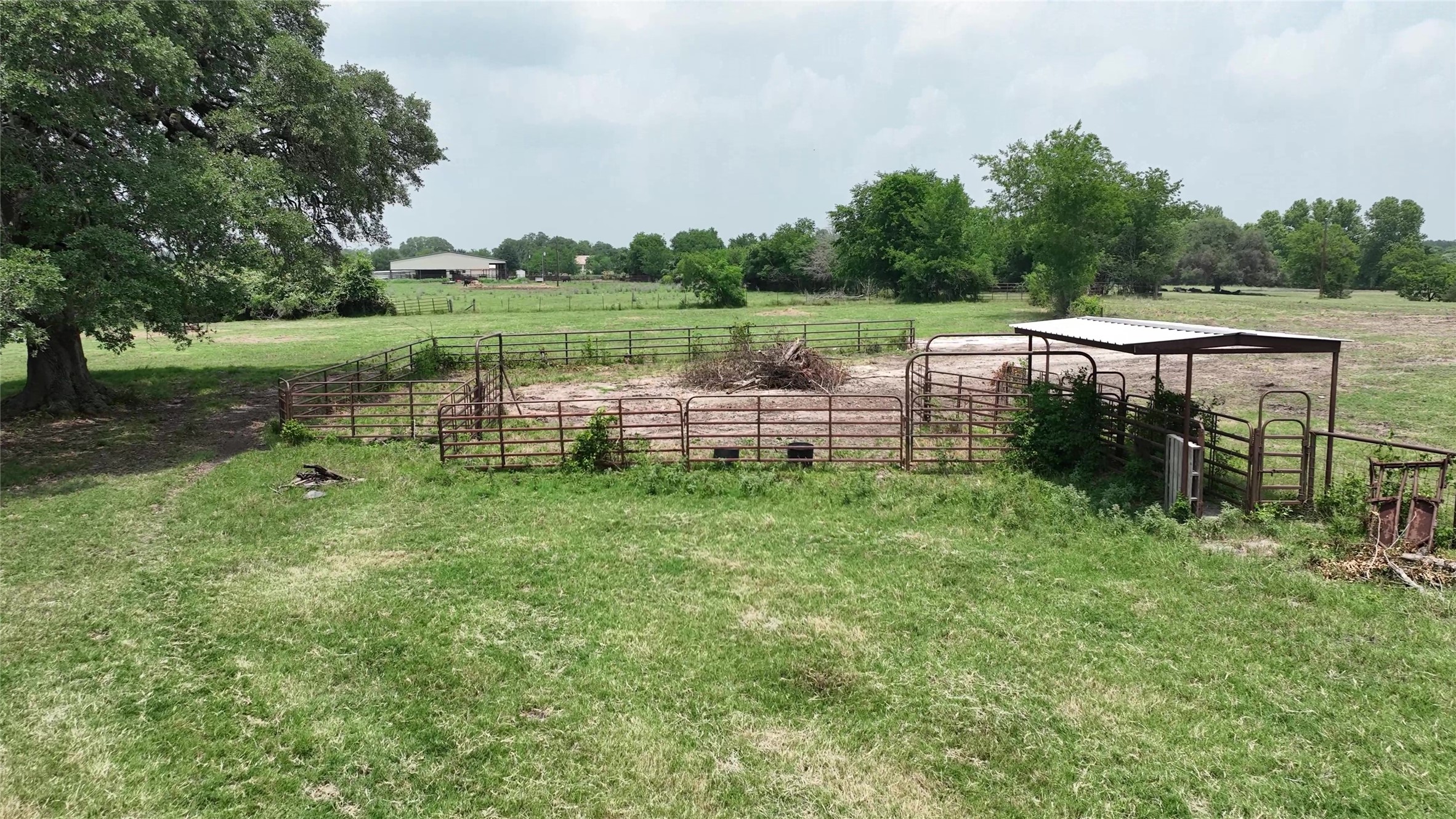 7009 Sandy Hill Road Brenham, TX 77833 - Photo 30 of 41 a view of a house with a yard