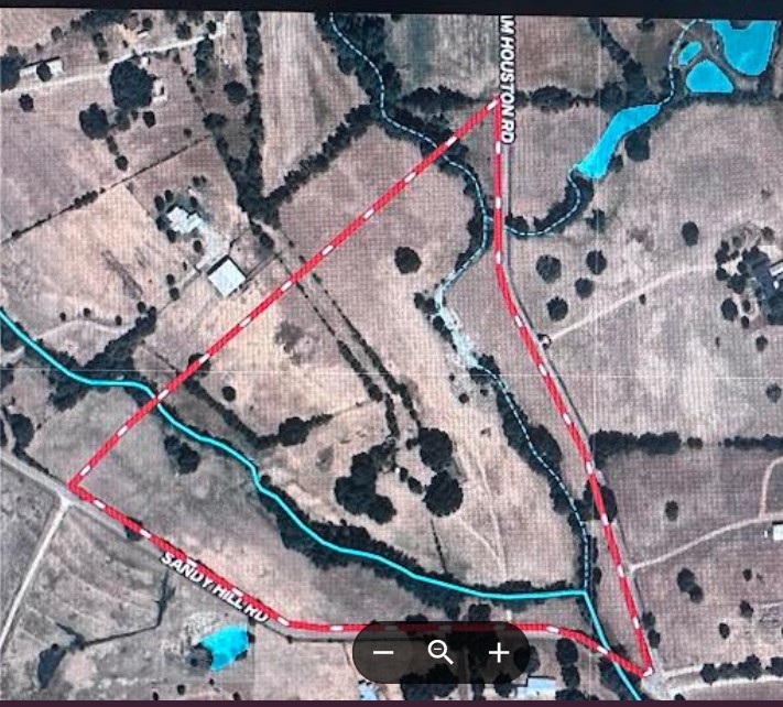 7009 Sandy Hill Road Brenham, TX 77833 - Photo 41 of 41 an aerial view of a fireplace with lots of trees