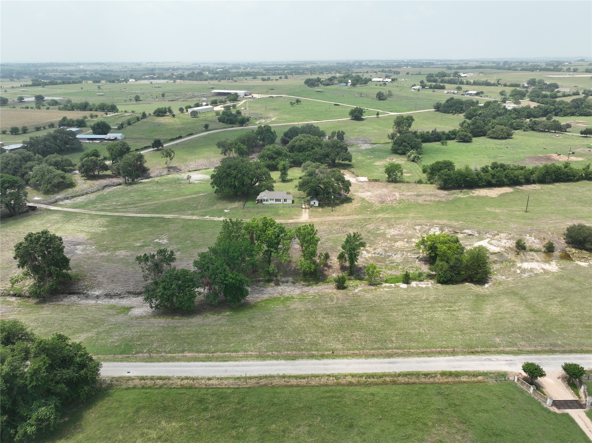 7009 Sandy Hill Road Brenham, TX 77833 - Photo 5 of 41 a view of lake with houses