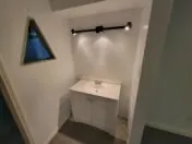a bathroom with a sink and vanity