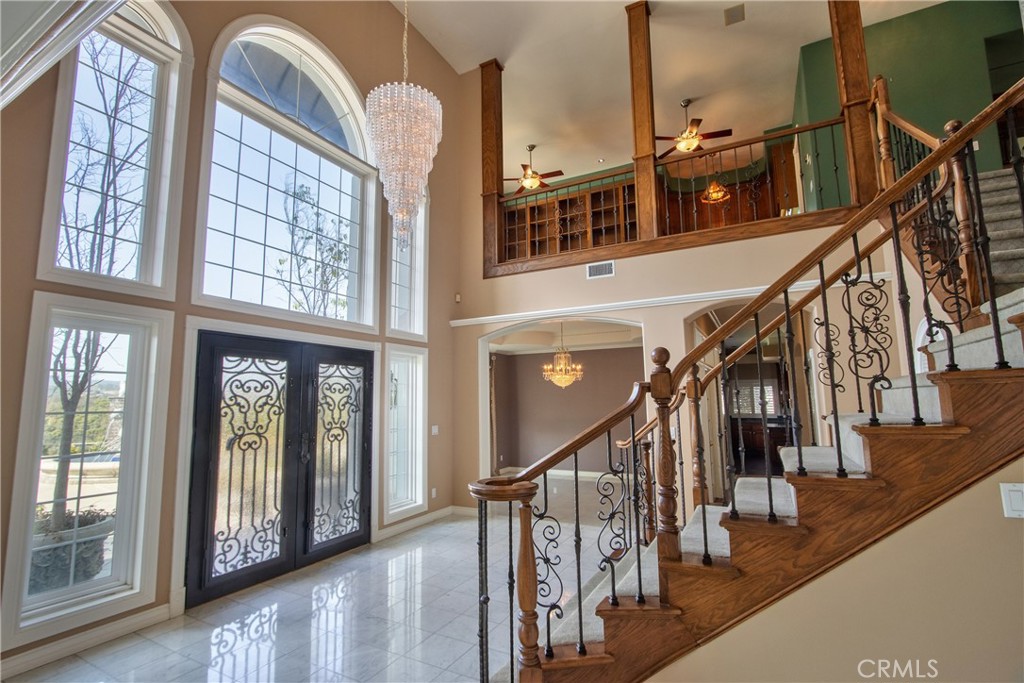 46856 El Prado Road Temecula, CA 92590 - Photo 16 of 75 a view of entryway and hall with wooden floor