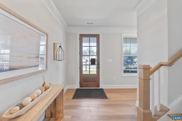 a room with a couch and a window