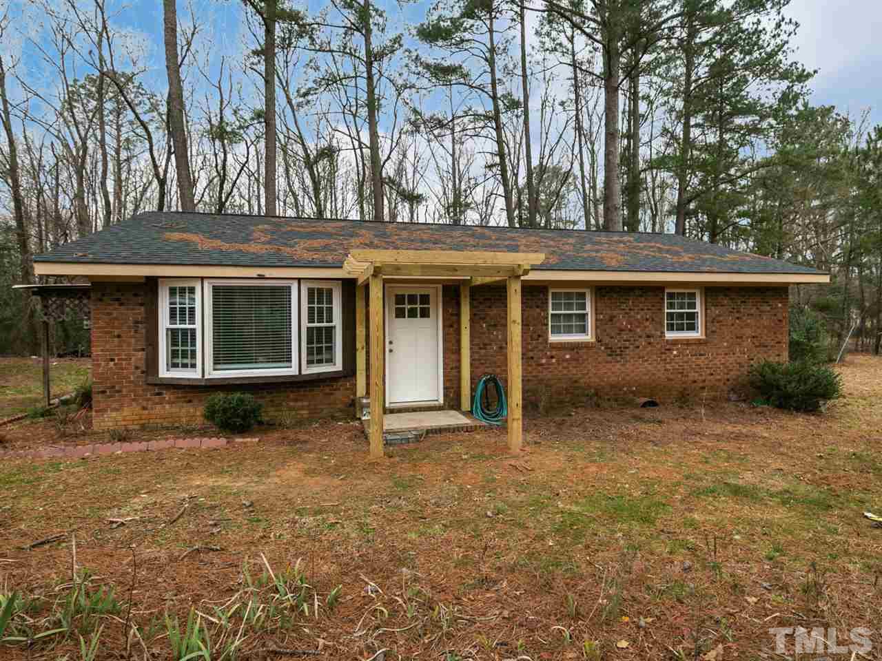 7532 Martin Road Zebulon, NC 27597 - Photo 1 of 26 front view of house with a yard