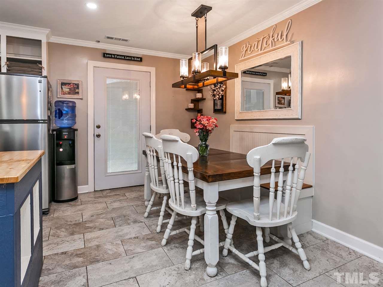 7532 Martin Road Zebulon, NC 27597 - Photo 11 of 26 a view of a dining room with furniture