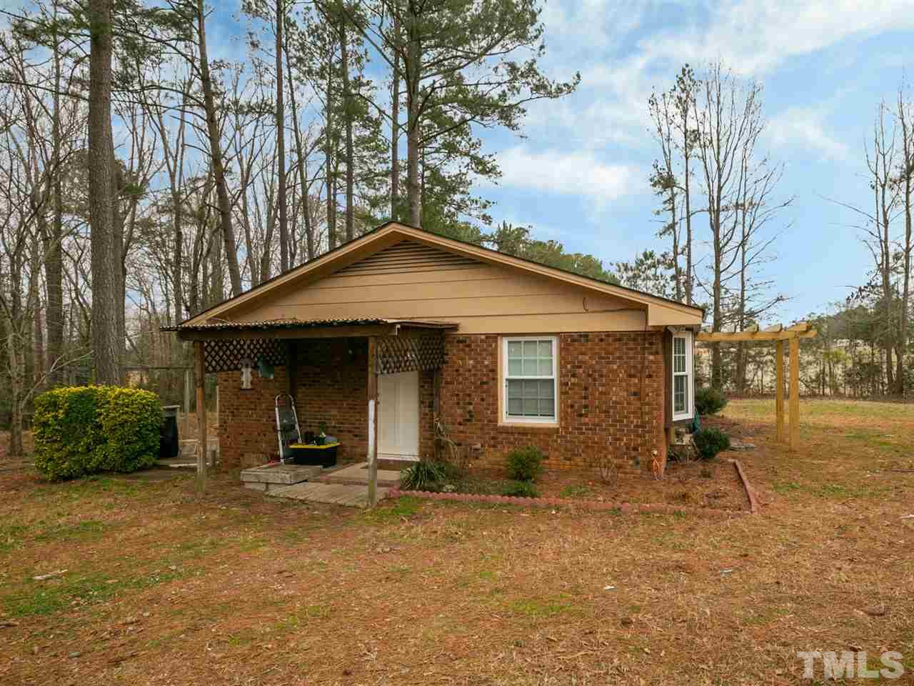 7532 Martin Road Zebulon, NC 27597 - Photo 26 of 26 a front view of a house with a yard