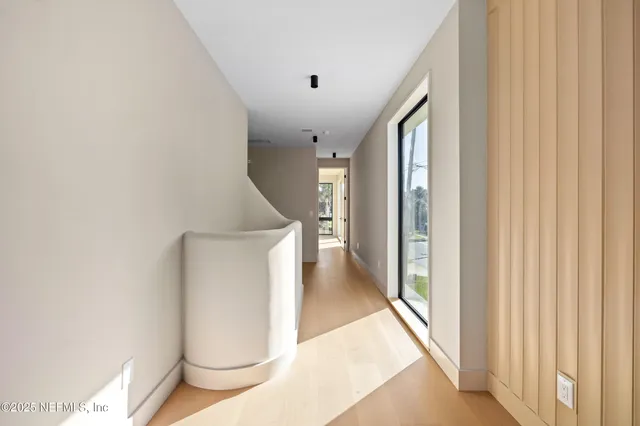 a view of a swimming pool with a lounge chairs