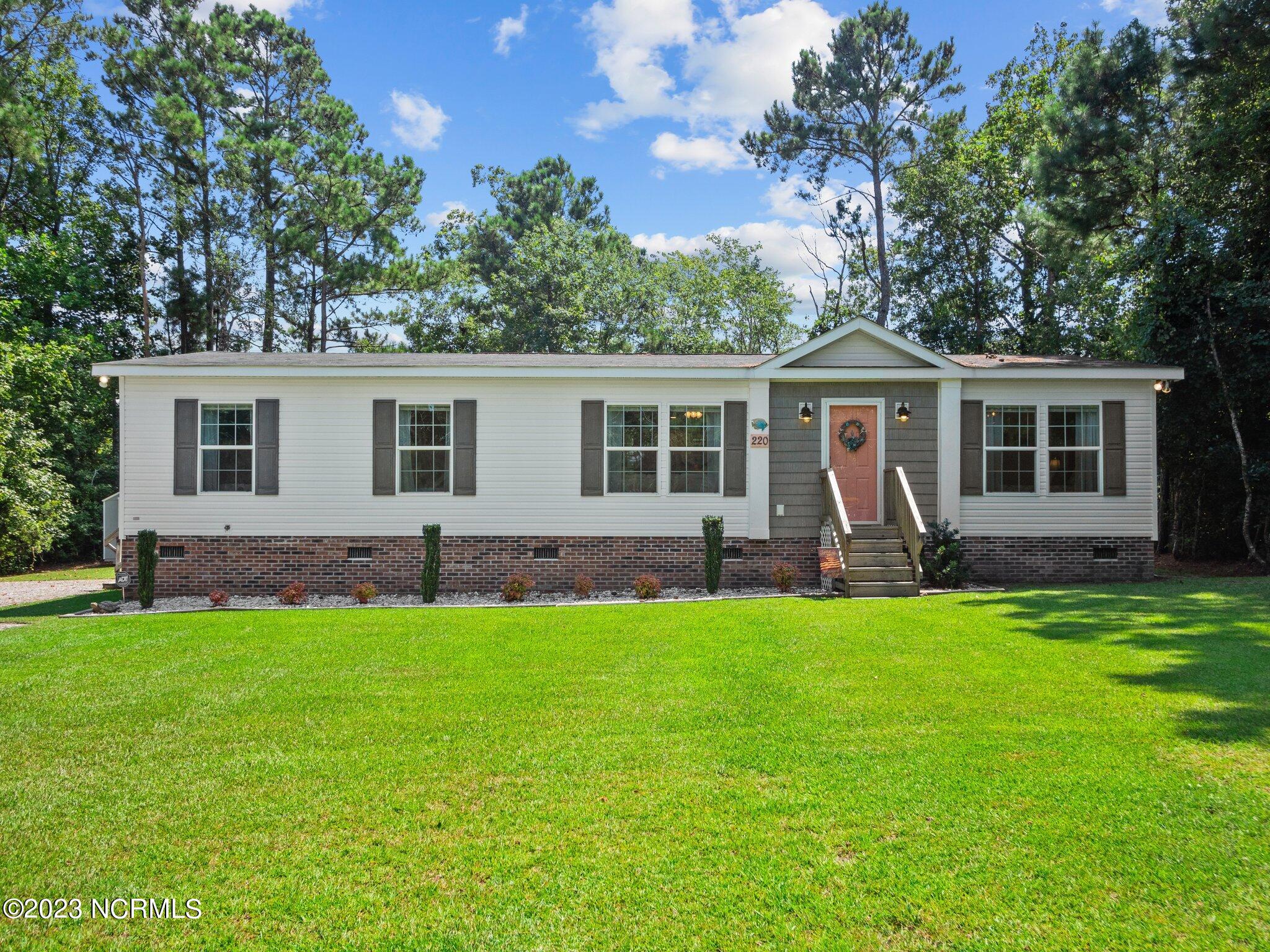 220 Doe Ridge Road Hampstead, NC 28443 - Photo 1 of 50 1-web-or-mls-01