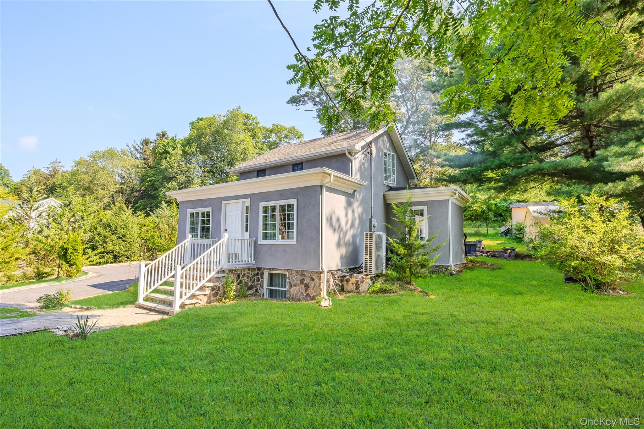 143 Rocky Point Landing Road Rocky Point, NY 11778 - Photo 1 of 43 a view of a house with backyard and a tree