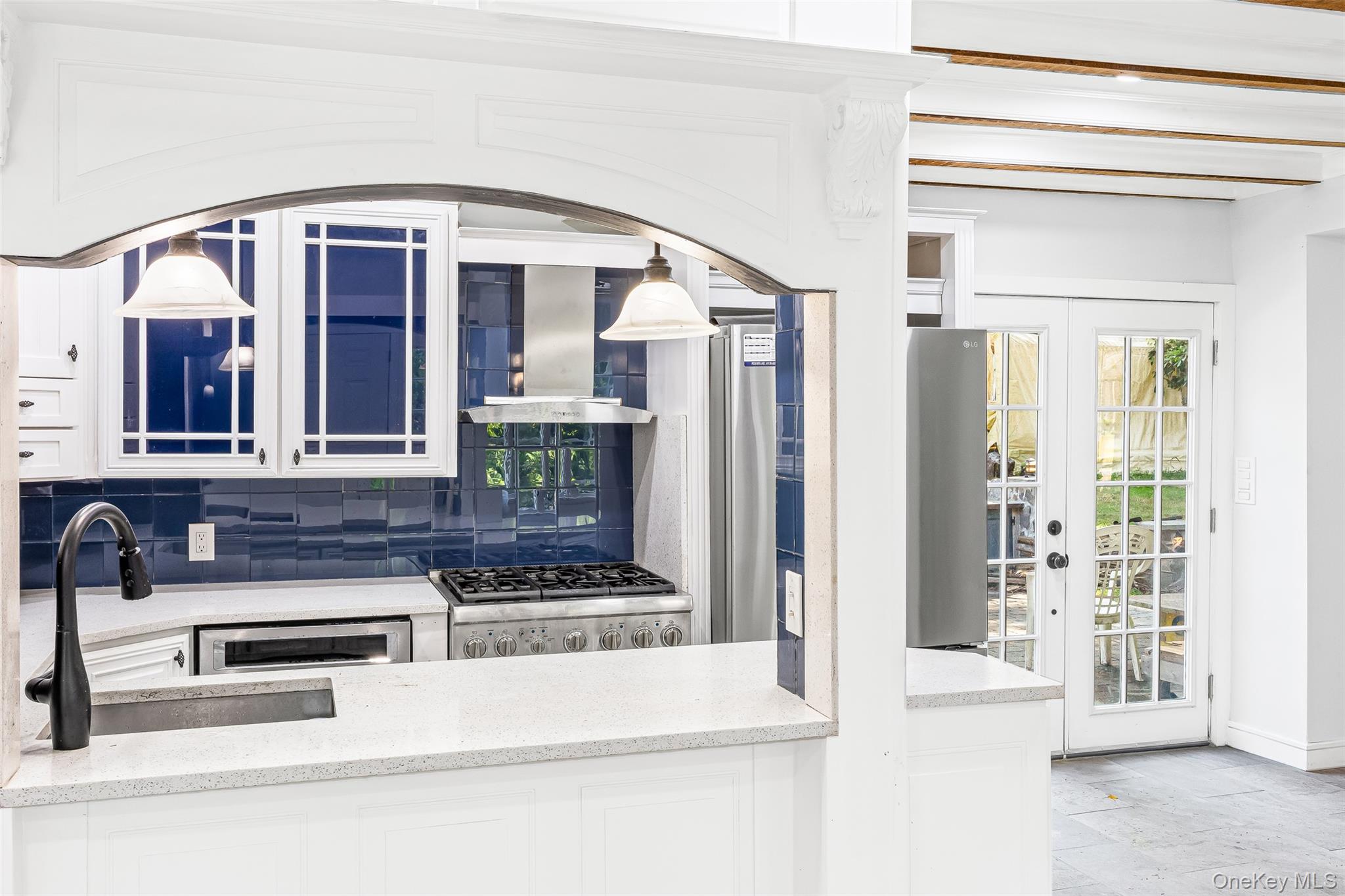 143 Rocky Point Landing Road Rocky Point, NY 11778 - Photo 13 of 43 a view of a hallway with entryway and kitchen