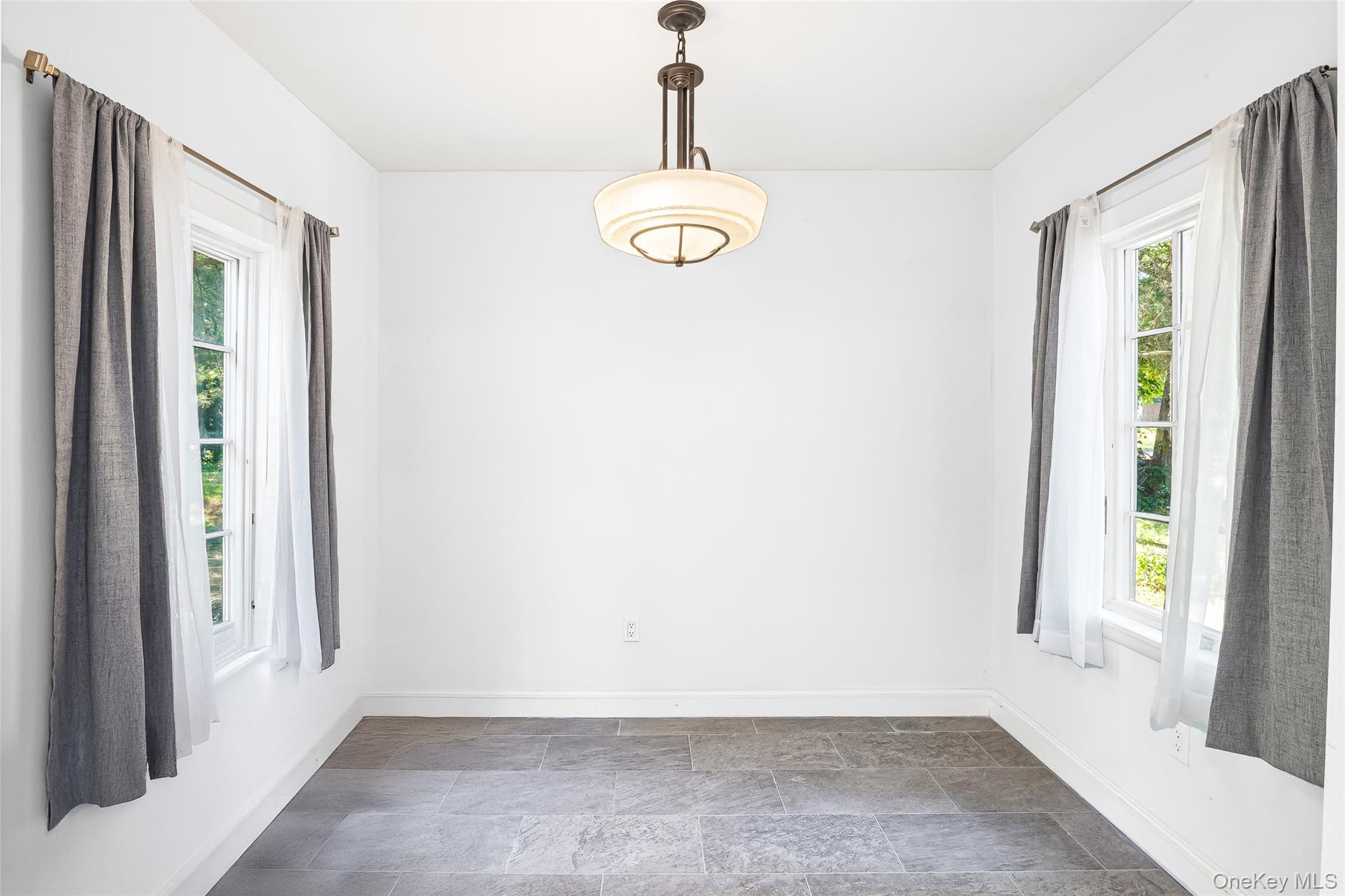 143 Rocky Point Landing Road Rocky Point, NY 11778 - Photo 16 of 43 a view of a room with window and front door