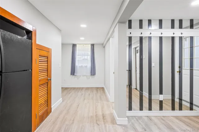 a swimming pool with some trees in the background