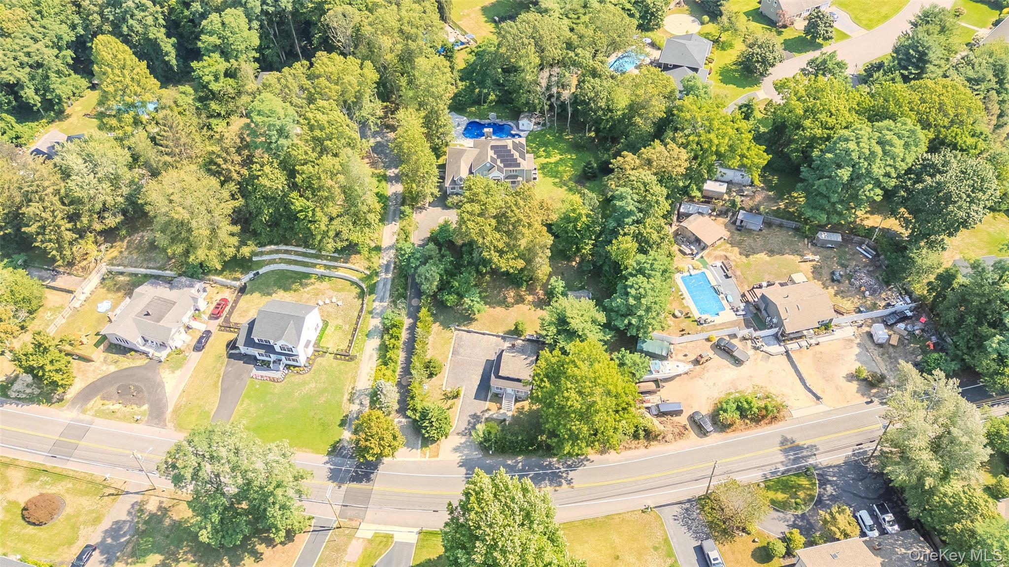143 Rocky Point Landing Road Rocky Point, NY 11778 - Photo 35 of 43 view of swimming pool and mountain view